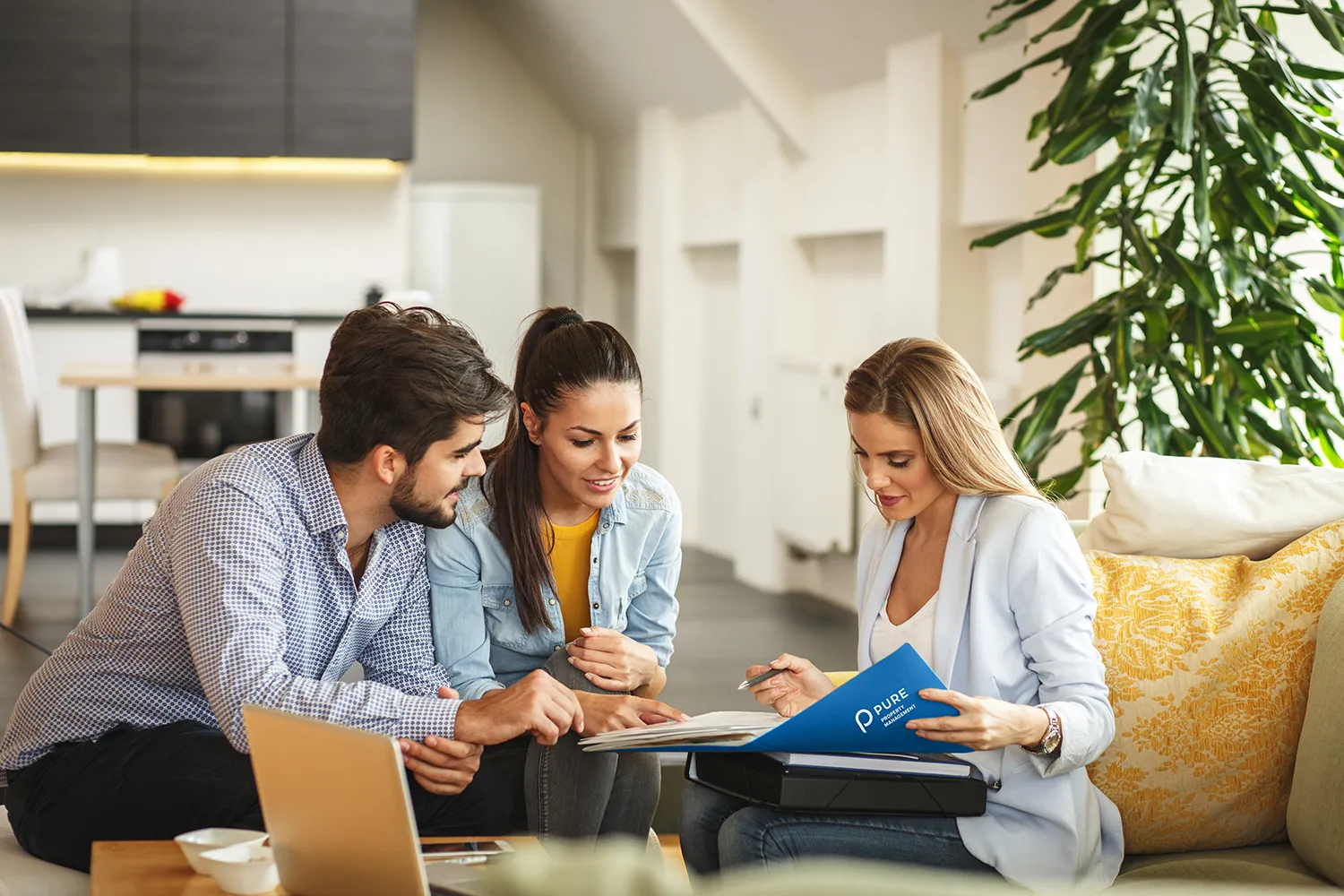 Agent Reviewing Paperwork with Residents